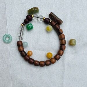 Wooden Bead Bracelet with Myanmar untreated jadeite beads and charms